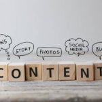 Create Content strategy Concept. Content wording on wooden cubes with speech bubbles.